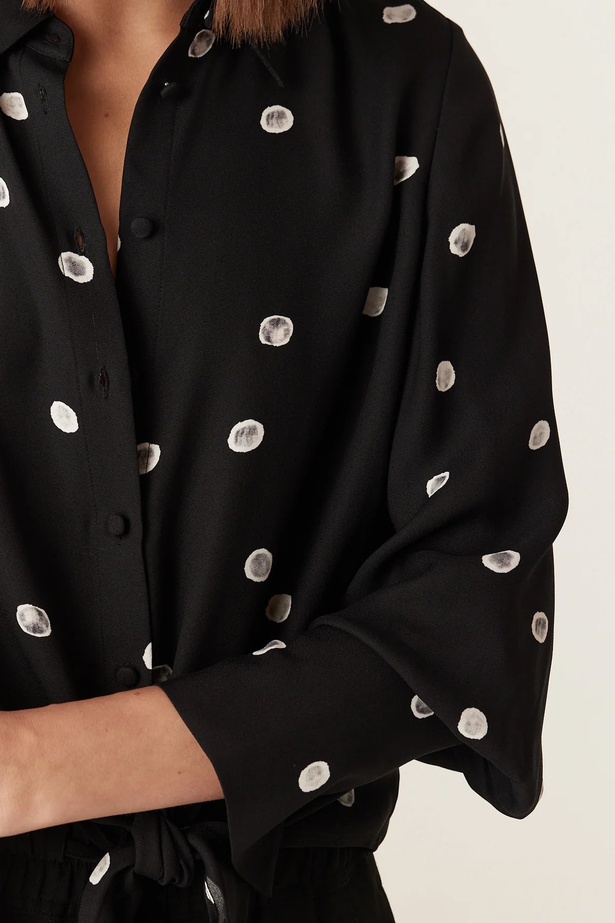 Close-up of the feature cuff and sleeve on the Cable Melbourne Hepburn Blouse in Black Spot