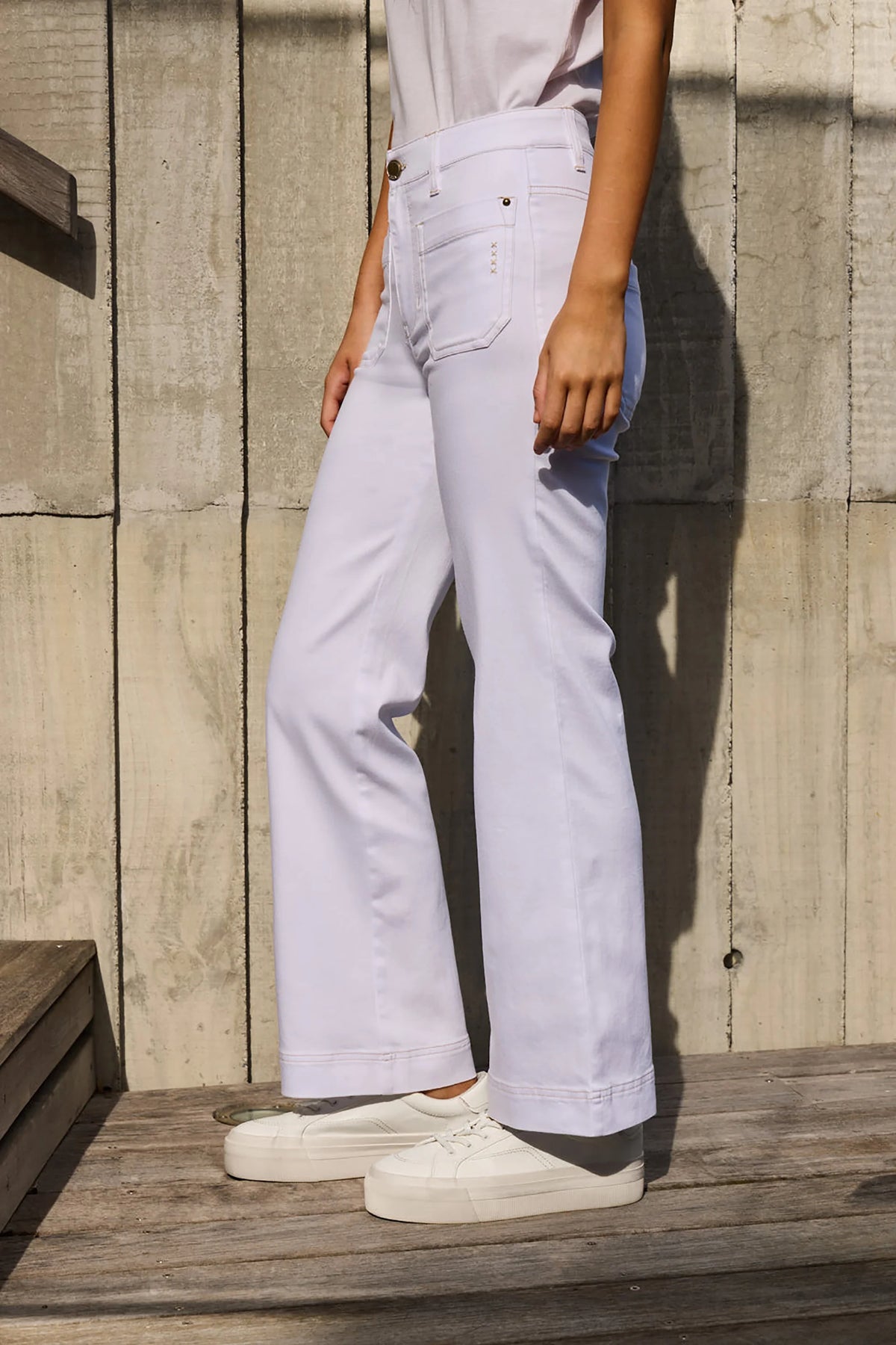Lania Chrome Blanc Jean in White, worn - side view showing the wide leg