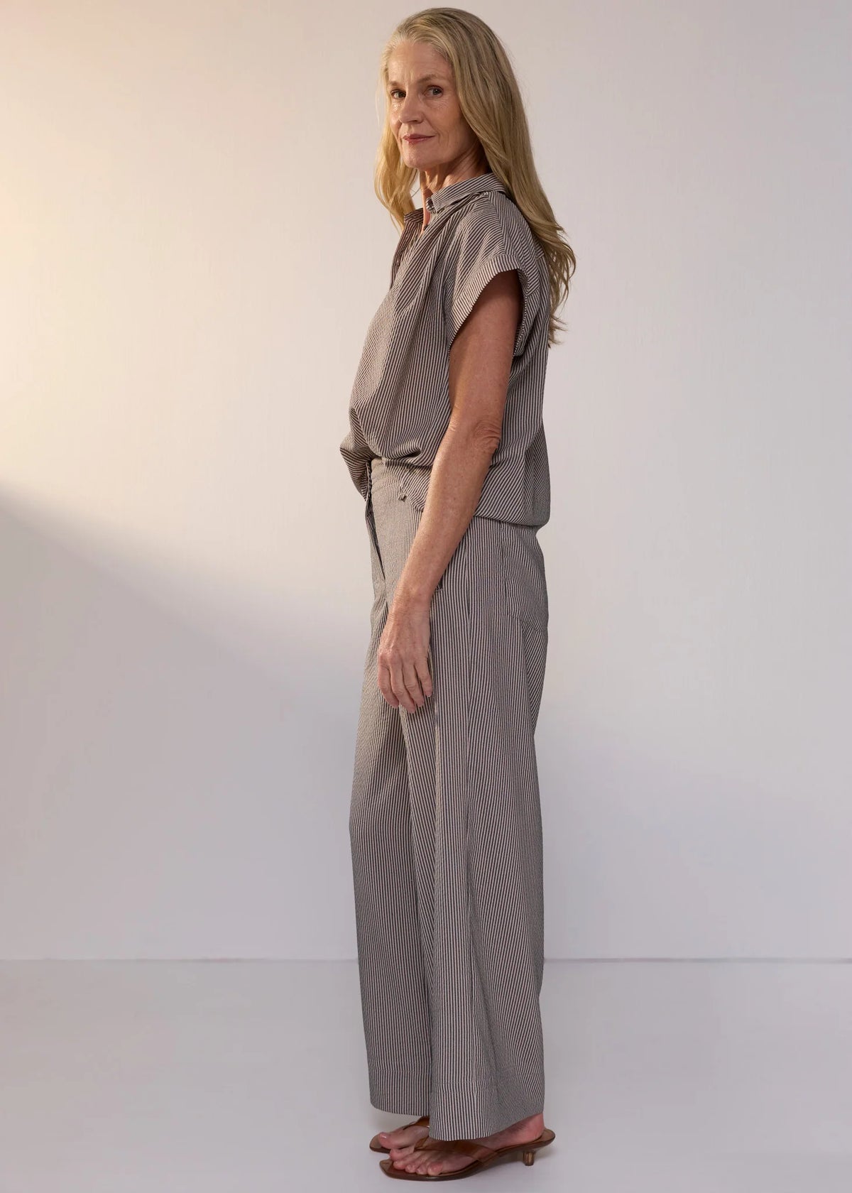 POL Clothing Dylan Shirt in Shadow Stripe, worn - side showing the cap sleeve